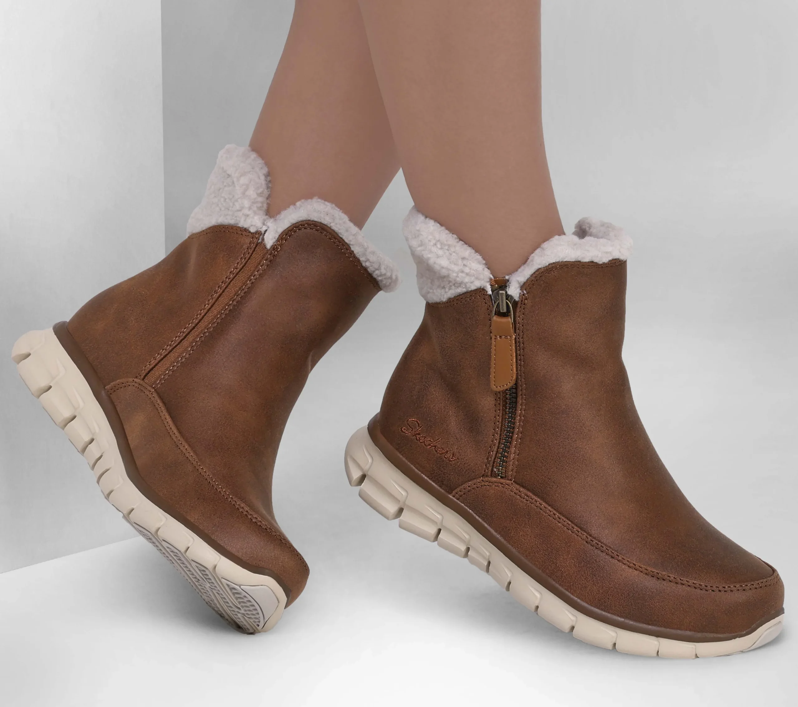 SKECHERS Synergy - Collab>Mujer Botas